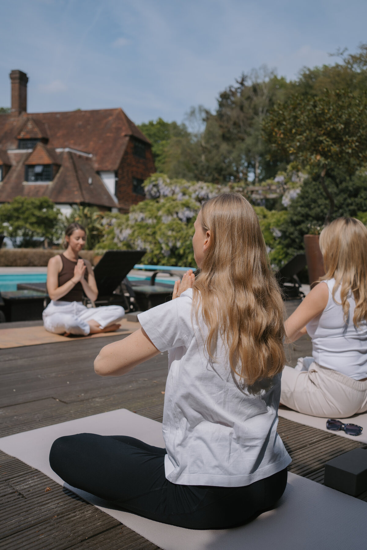 A gentle yoga and breathwork moment at a previous Mother Reset Retreat